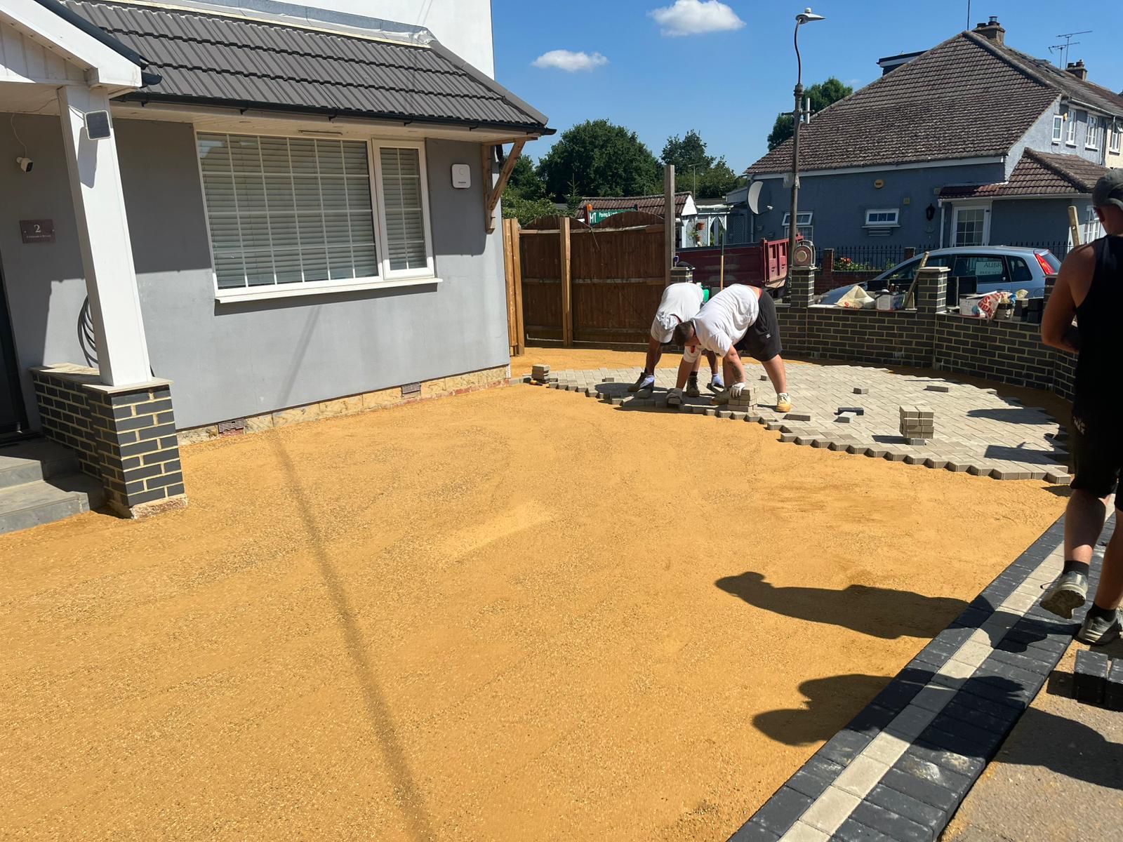 laying a new charcoal block paving driveway in st albans