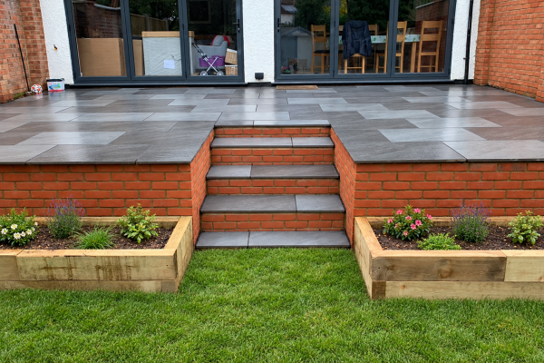 new turf, porcelain patio and garden steps in st albans